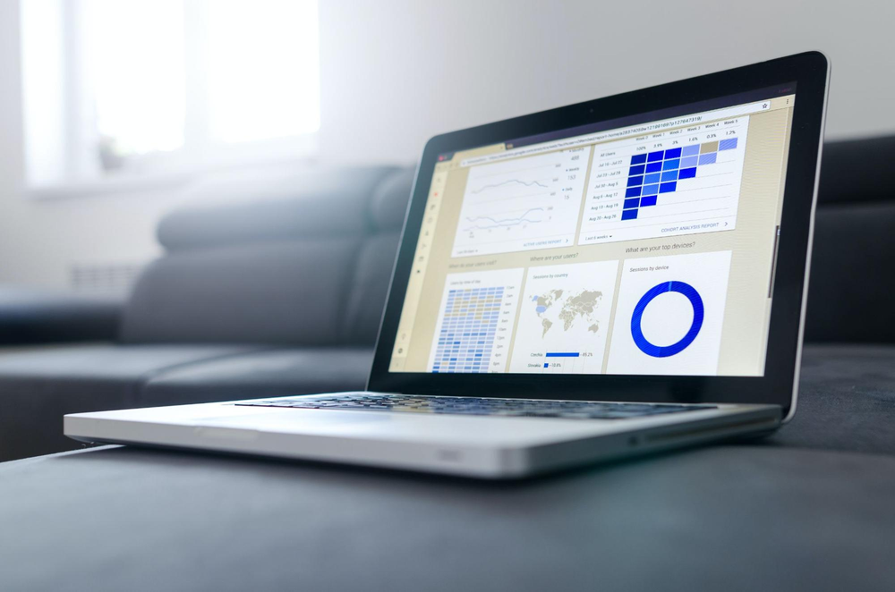 a laptop with charts