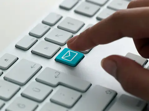 a keyboard with an email button