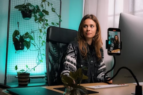 A businesswoman shooting a video of herself