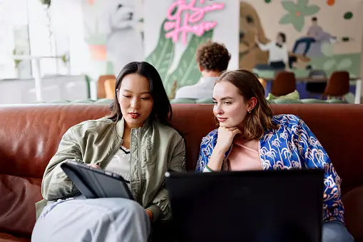 Two girls discussing